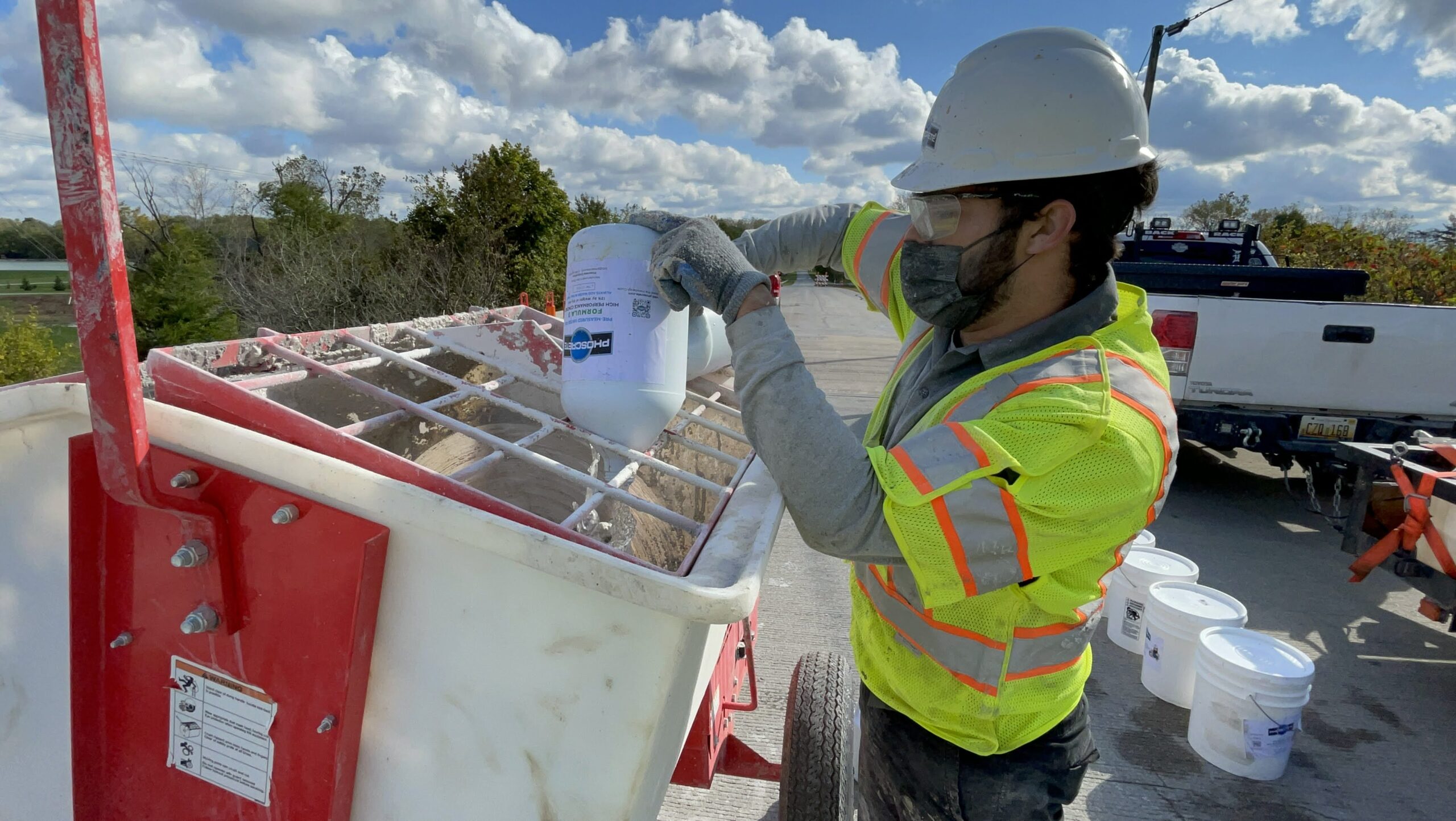 QC Manager Jorge Giro mixes Phoscrete in a paddle style mortar mixer for the 2021 Ohio NTPEP Test Deck installation.
